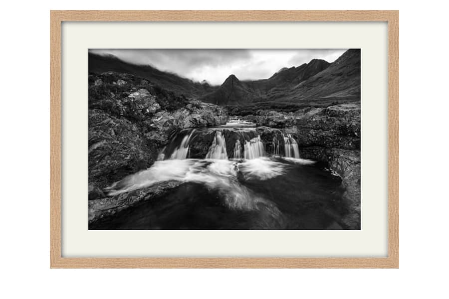 Black and White Isle of Skye Fairy Pools framed artwork in an Oak frame with white mount
